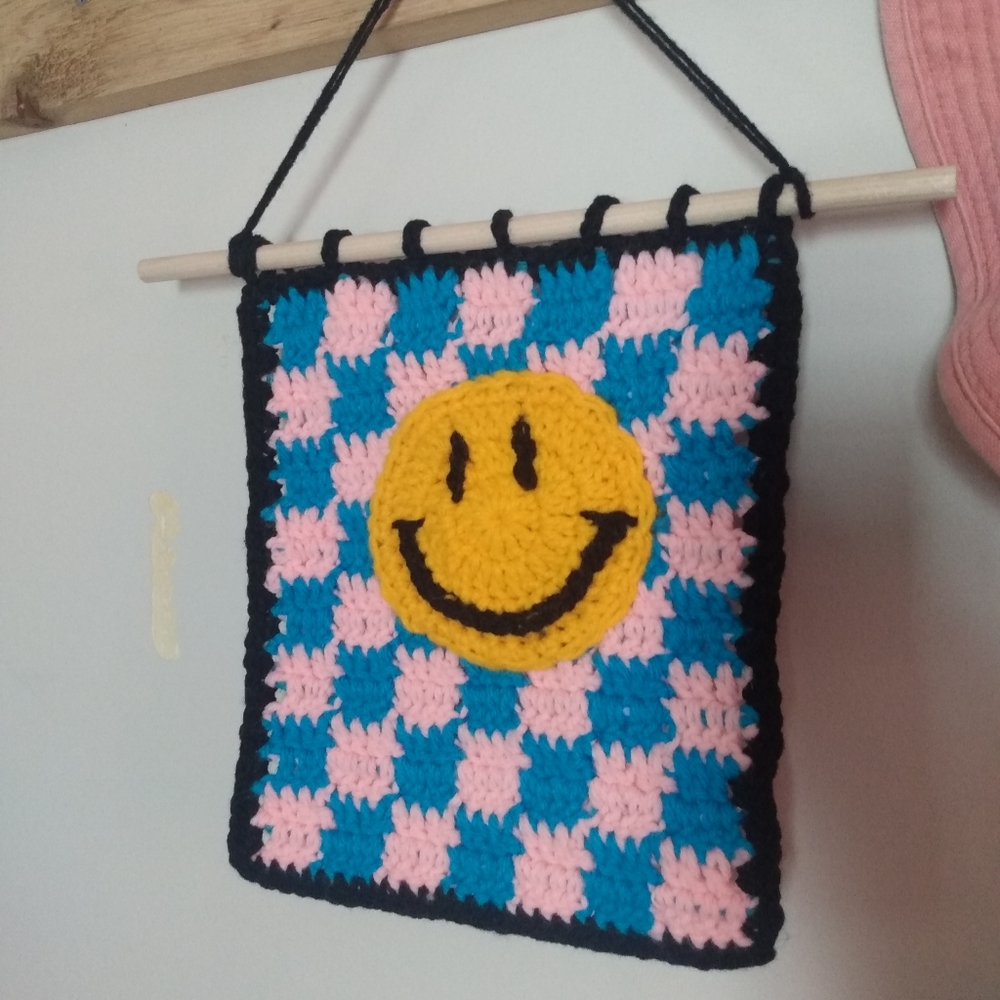 Crochet smiley wall decor